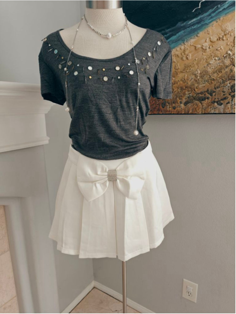 Women's White Pleated Mini Skirt with Bow Detail